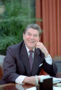 Photo of President Reagan seated at desk